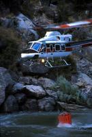 Kachina Bell 412 dipping into the Salmon River