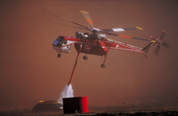 Helicopter Transport Services S-64 dipping into water pumpkin on the Coal Seam Fire, Colorado